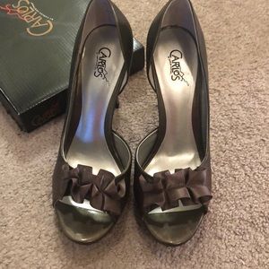 Carlos Santana pretty old silver heels